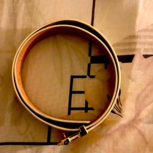 White Louis Vuitton belt worn a couple times in perfect shape looks brand new